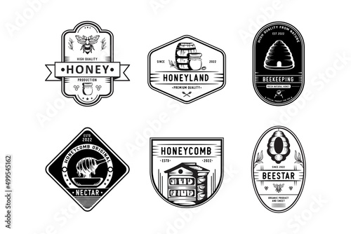 Set of vintage honey and bee labels, badges and design elements