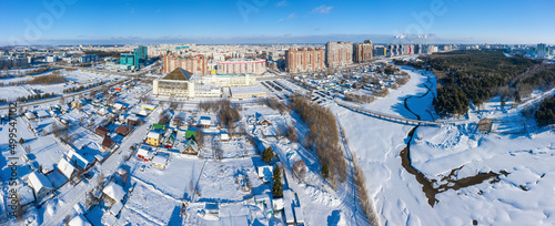 Surgut city in winter. Residential area, panoramic view of the city. Aerial view.