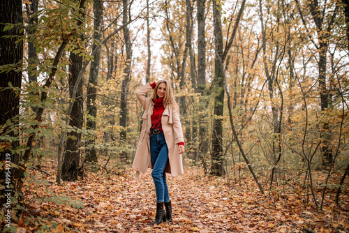 Beautiful girl, girl in a coat, girl in the woods © PPZASIDKO