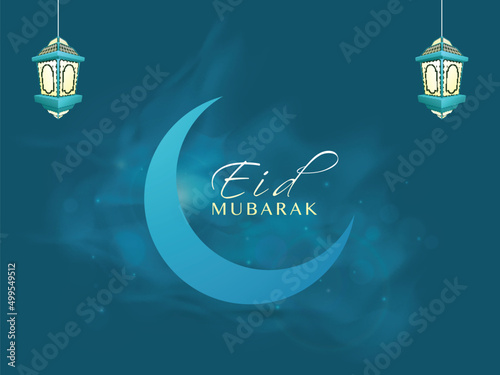 Eid Mubarak Concept With Crescent Moon, Arabic Lanterns Hang On Blue Smoke Lights Effect Background.
