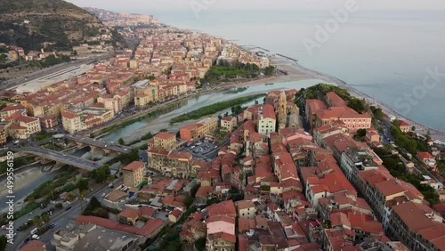 Aerial drone shot of old and new town, city of Ventimiglia, Liguria, Italy Beautiful panoramic aerial view from flying unmanned aerial vehicle of Ligurian Riviera photo