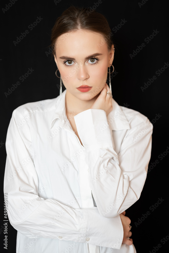Portrait of a beautiful young woman with brown eyes. Portrait of a beautiful young woman with brown eyes.
