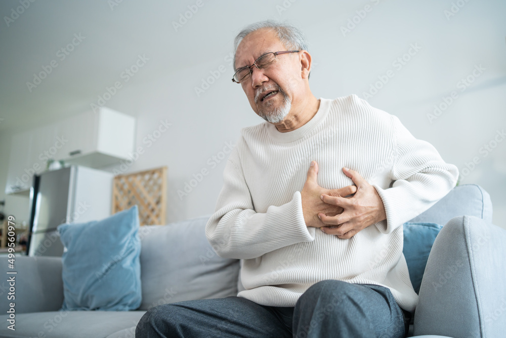 Asian senior older man having chest pain feel suffer from heart attack