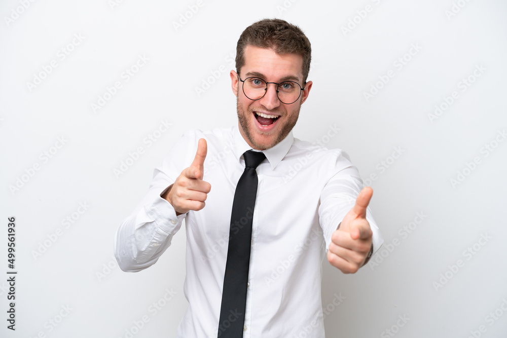 Young business caucasian man isolated on white background pointing to the front and smiling