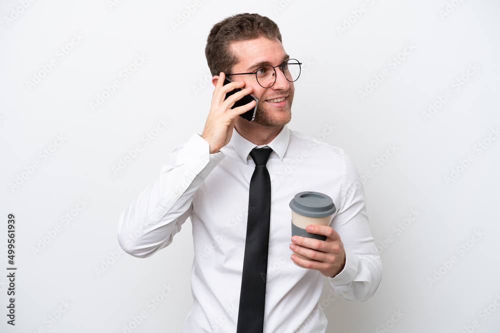 Young business caucasian man isolated on white background holding coffee to take away and a mobile