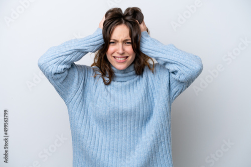 Young caucasian woman isolated on white background doing nervous gesture © luismolinero