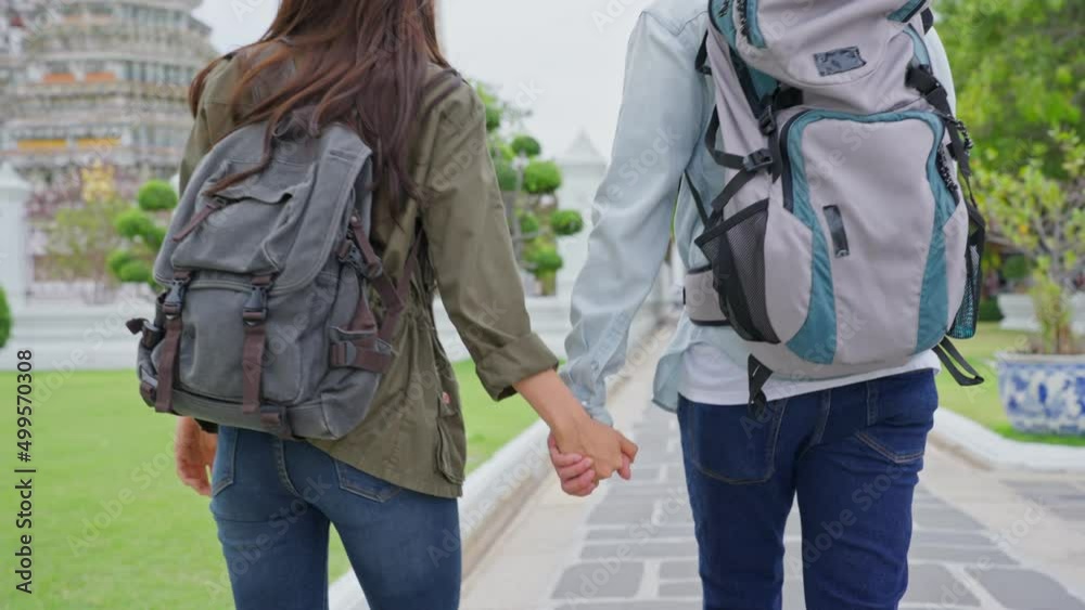 Asian attractive romantic couple travel in the city for honeymoon trip Asian attractive romantic couple travel in the city for honeymoon trip