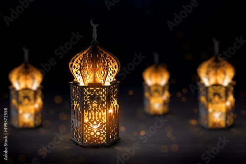 Fotobehang Arabic lantern glowing on dark background
