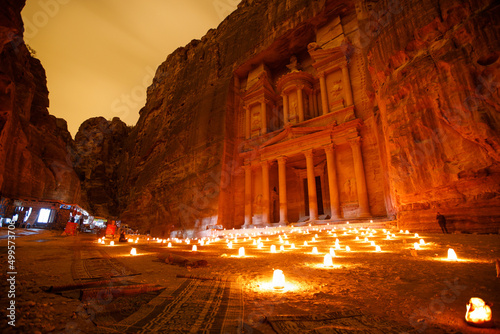 Petra in Jordan, the Treasury Al Khazneh at night with candles, popular archeleogical tourism site and travel destination in the middle east, old city