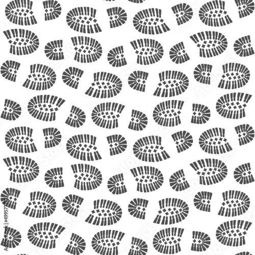 Seamless pattern with a footprint of shoes. Vector illustration.