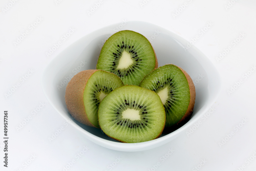 White bowl with kiwis White bowl with kiwis
