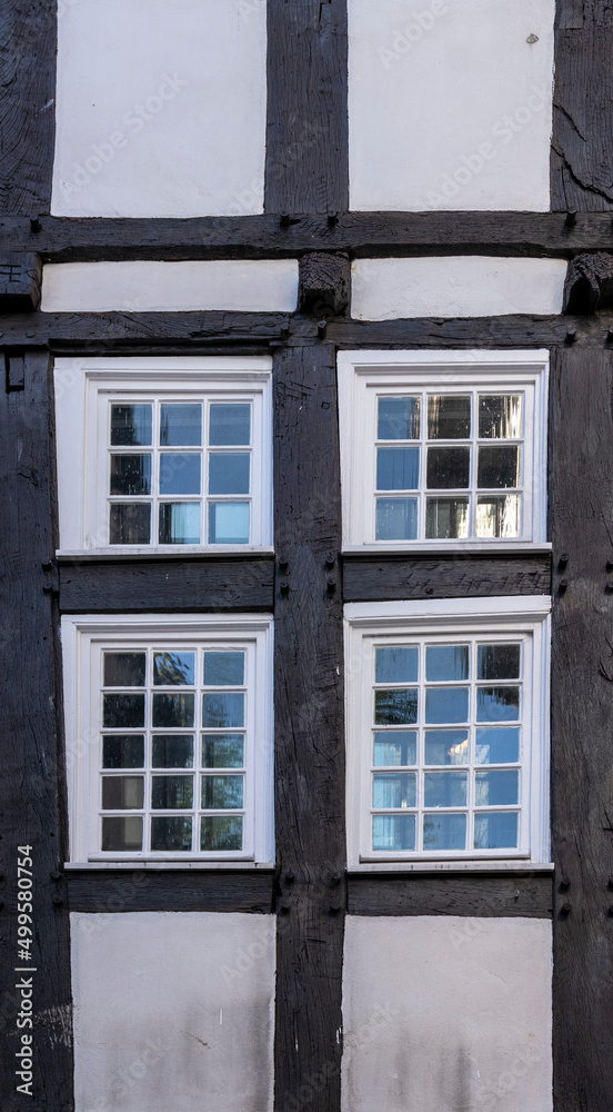 Obraz premium old half-timbered house facade with windows 