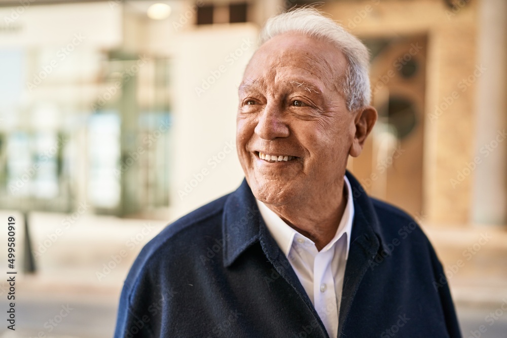 Senior man smiling confident standing at street Senior man smiling confident standing at street