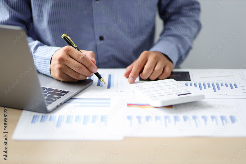 Business analyze and company performance on financial report paper Investment advisor, financial advisor, and accounting concept. Business analyze and company performance on financial report paper Investment advisor, financial advisor, and accounting concept.