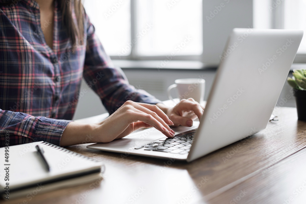 Woman hands typing on computer keyboard closeup, businesswoman or student girl using laptop at home, online learning, internet marketing, working from home, office workplace freelance concept Woman hands typing on computer keyboard closeup, businesswoman or student girl using laptop at home, online learning, internet marketing, working from home, office workplace freelance concept
