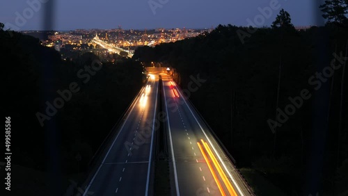 Night traffic on Trasa Kwiatkowskiego highway in Gdynia, Poland, time lapse photo