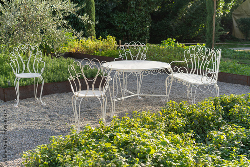 Classic white garden furniture in a garden