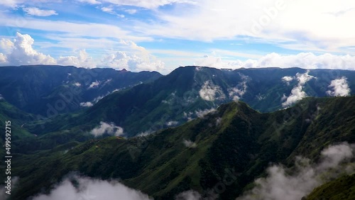 dramatic cloud movement at mountain valley at morning from hill top video is taken at laitlum peak shillong meghalaya india. photo