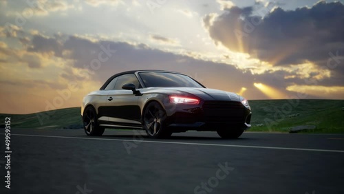 Black car driving on an asphalt highway. Beautiful sunset landscape. Road trip in a sun rays on horizon. 
