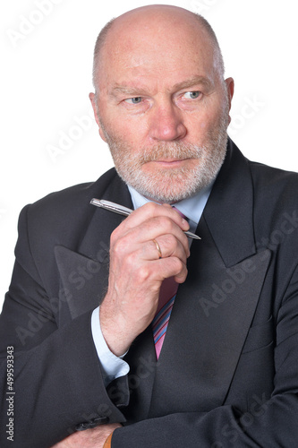 Elderly businessman with pen isolated on white background