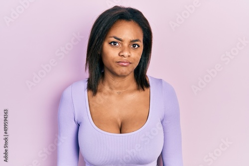 Young african american girl wearing casual clothes depressed and worry for distress  crying angry and afraid. sad expression.