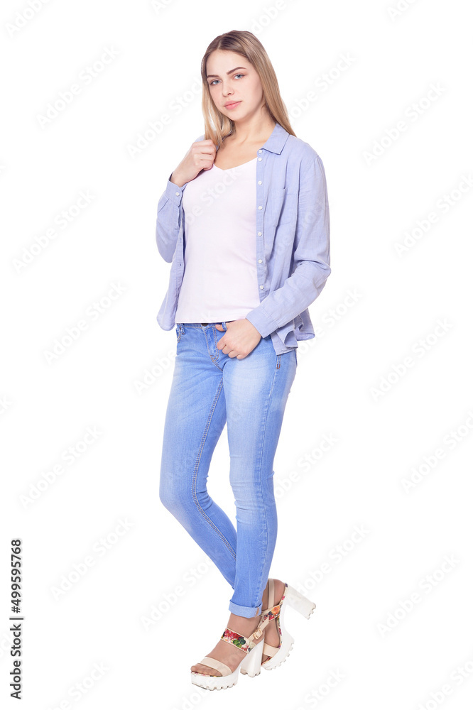 Beautiful woman in blue jeans isolated on white background Beautiful woman in blue jeans isolated on white background