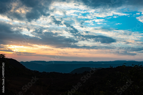 dramatic sunset colorful sky over mountain shadow at morning from flat angle