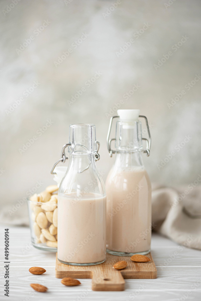 homemade vegetable almond milk in glass bottles homemade vegetable almond milk in glass bottles