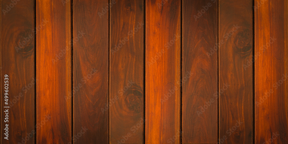 Naklejka premium Dark wood wall texture with natural pattern for background. brown wooden planks background 