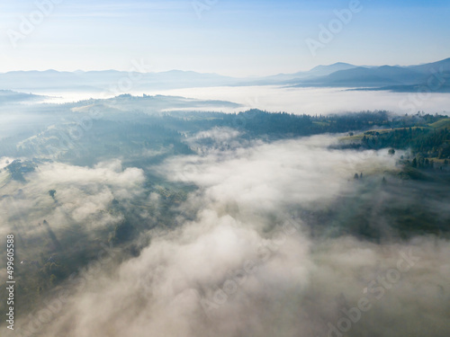 Morning fog in the Ukrainian Carpathians. Aerial drone view. © Sergey