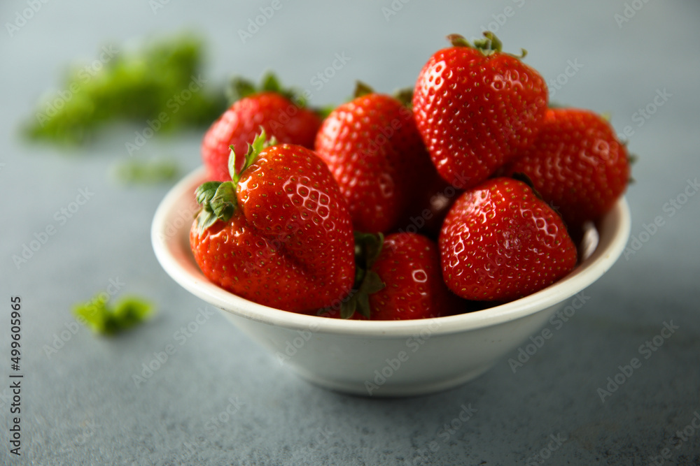 Fresh ripe strawberry in a white bowl Fresh ripe strawberry in a white bowl
