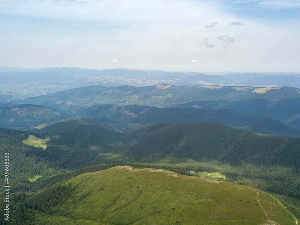 Obraz premium High mountains of the Ukrainian Carpathians in cloudy weather. Aerial drone view.
