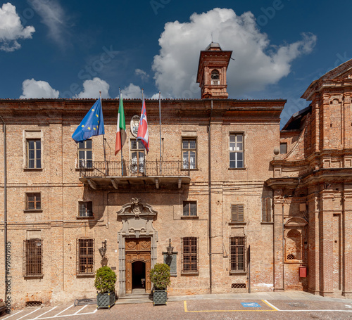 Saluzzo, Cuneo, Italy : the town hall in Via Macallè, the facade of the building with the entrance with the flags of Europe, Italy and Piedmont photo