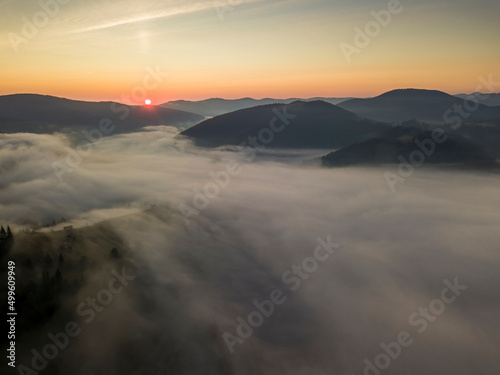 Morning fog in the Ukrainian Carpathians. Aerial drone view.