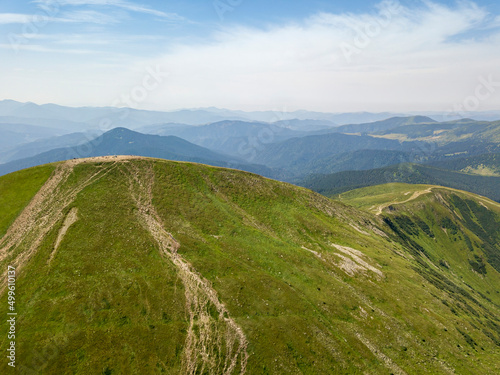 Fototapeta Naklejka Na Ścianę i Meble -  High mountains of the Ukrainian Carpathians in cloudy weather. Aerial drone view.