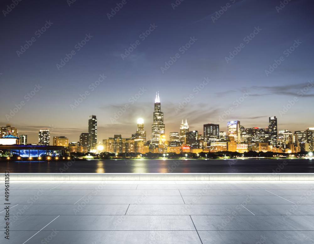 Empty concrete embankment on the background of a beautiful blurry Chicago city skyline at evening, mockup