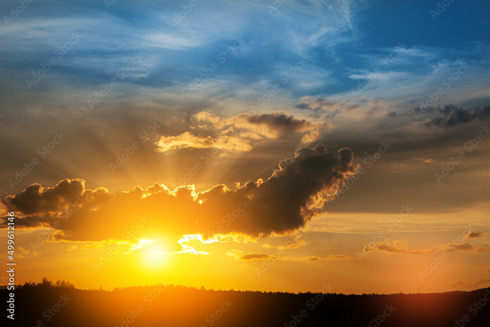 Gorgeous panorama scenic of the strong sunrise with cloud on the orange sky Gorgeous panorama scenic of the strong sunrise with cloud on the orange sky