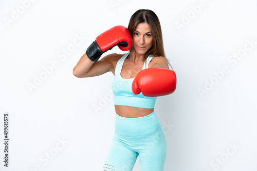 Middle age caucasian woman isolated on white background with boxing gloves