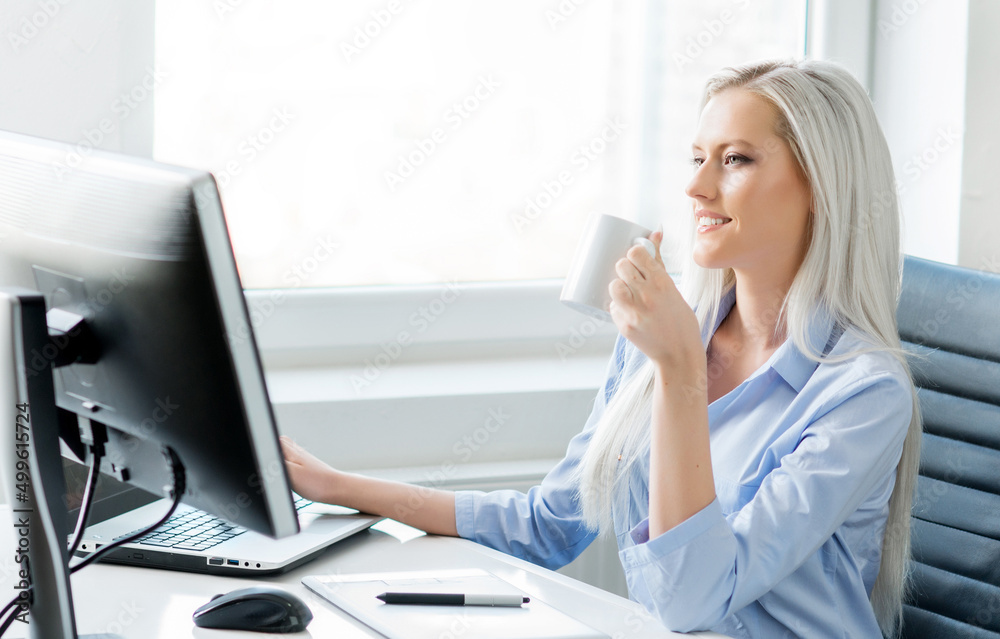 Young Woman Works at Home Office Using Computer. Workplace of Female Entrepreneur, Freelancer or Student. Remote Work and Education Concept. Young Woman Works at Home Office Using Computer. Workplace of Female Entrepreneur, Freelancer or Student. Remote Work and Education Concept.