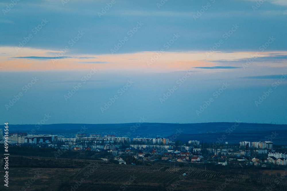 sunset view over a small city. spring landscape. High quality photo sunset view over a small city. spring landscape. High quality photo