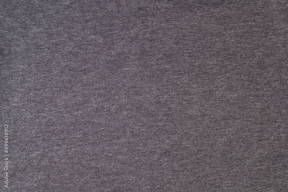 Fototapeta premium Grey knitted fabric cotton textured background. Closeup with copy space for your design