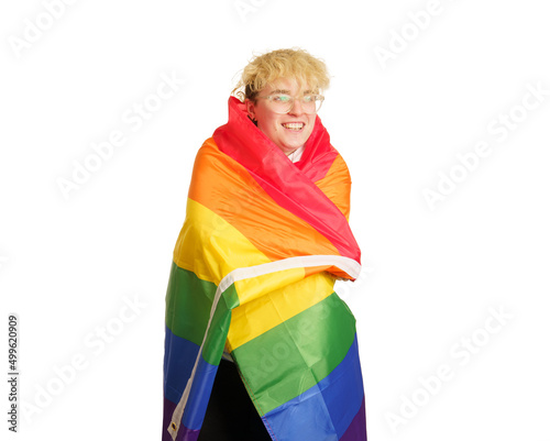 Woman wrapped in rainbow flag on a white background