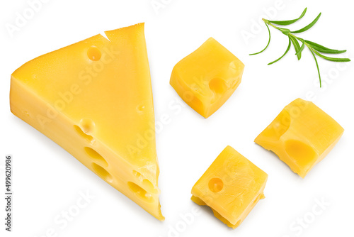 Cut of cheese with slices and rosemary isolated on white background. Clipping path and full depth of field. Top view