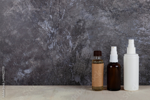 Jars with cosmetic lotions and oils. Skin care.