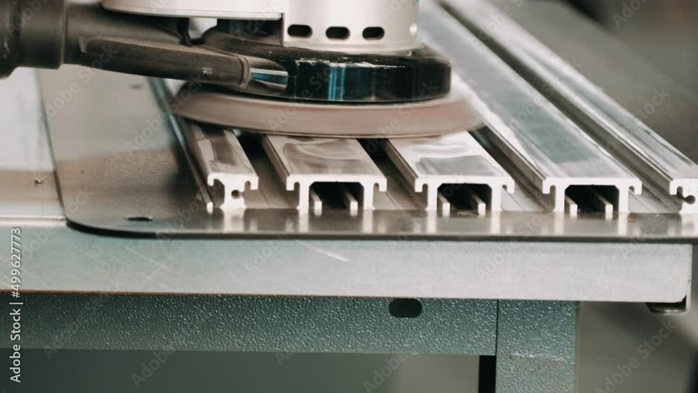 CNC metal grinding machine. Make the steel part smooth to shine. Grinding a metal workpiece. Metalworking, industrial, equipment, technology, machining, manufacturing concept CNC metal grinding machine. Make the steel part smooth to shine. Grinding a metal workpiece. Metalworking, industrial, equipment, technology, machining, manufacturing concept