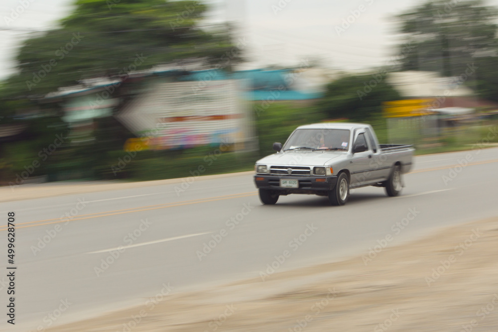 pick-up Speeding in road, panning camera, Thailand asia