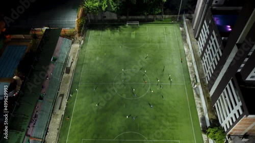aerial view of a soccer field in the middle of a friendly match photo
