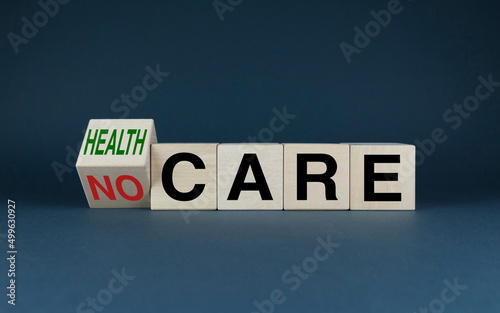 Health care or no care. Cubes form the words Health care or no care