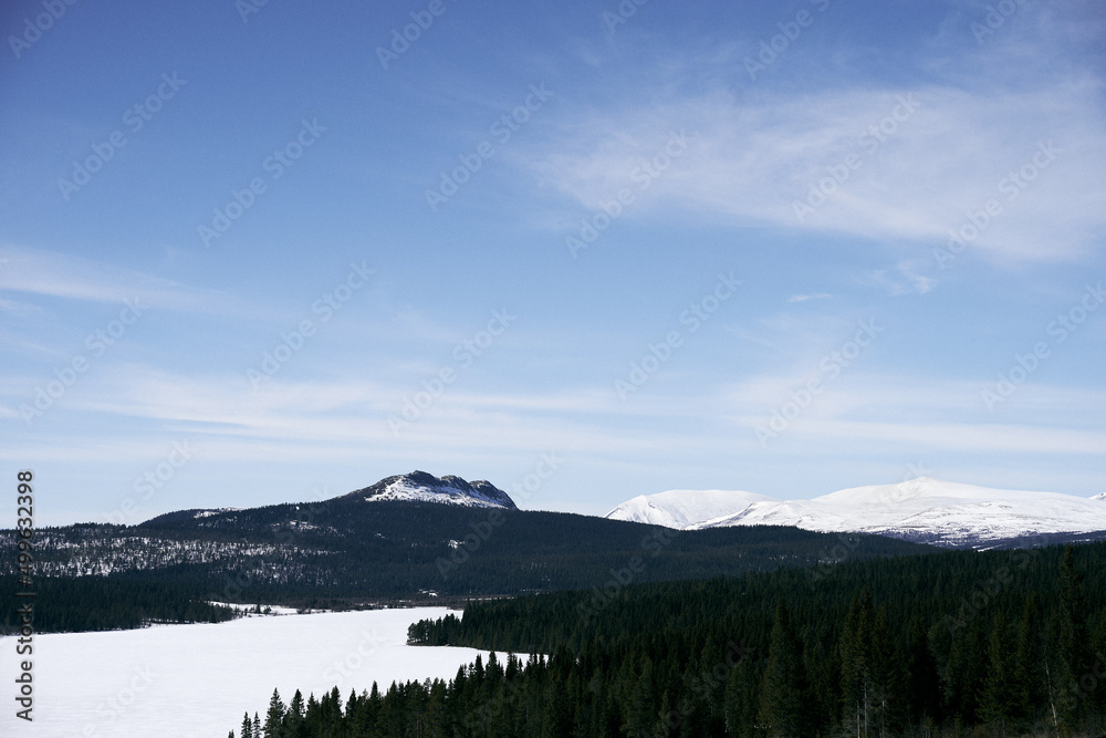Mountain landscape in winter by Gålåvannet Lake in Oppland, Norway.