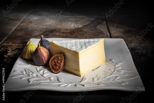 Triple Cream Saint Angel Cheese on a White Platter with Figs